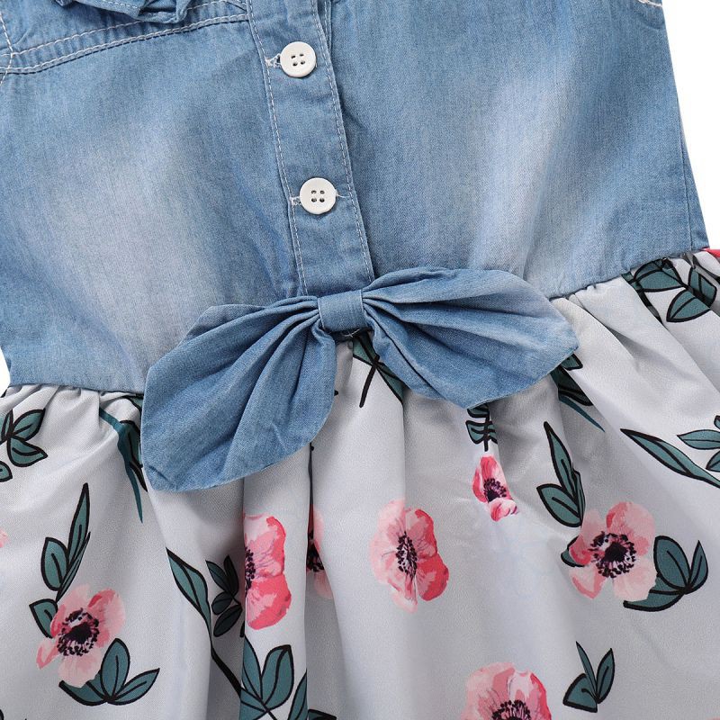 Đầm Denim Sát Nách Hoạ Tiết Hoa Cho Bé