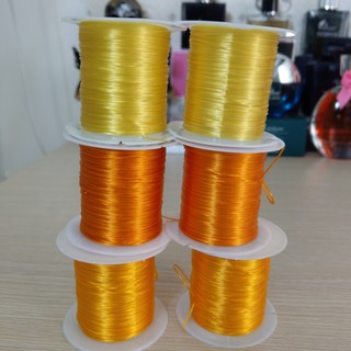1 cuộn 10 mét dây thun co giản sỏ hạt vòng đeo tay - Dây loại mỏng 0.3ly