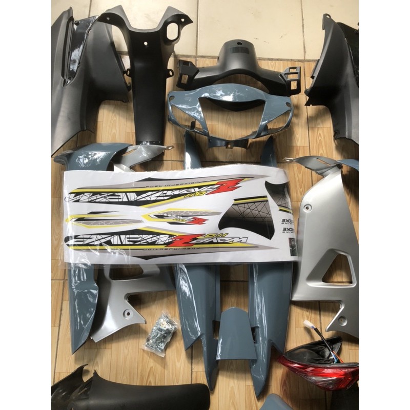 Dàn áo RS màu xi măng tặng kèm đèn lái ,tem và ốc áo xe  nhận sơn theo yêu cầu của khách hàng