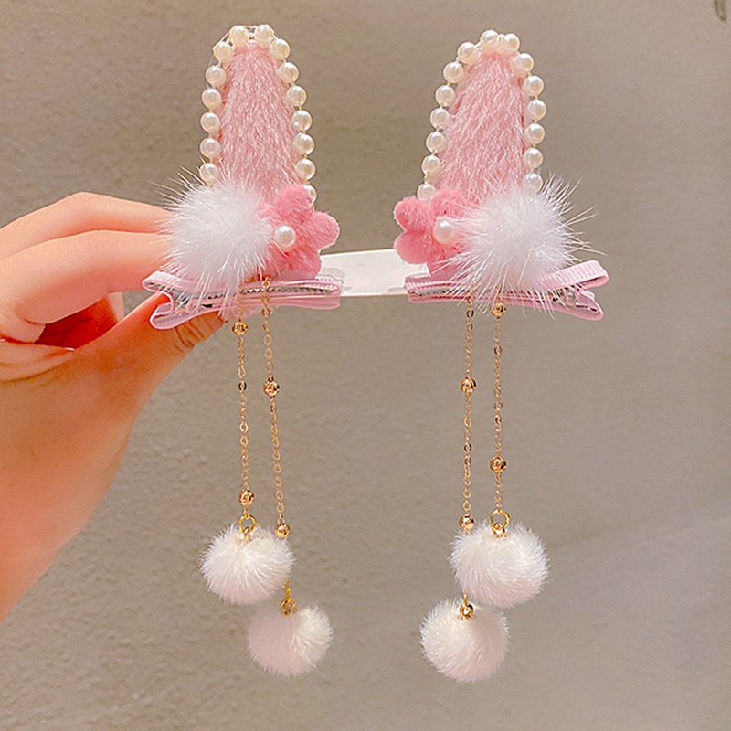 Kẹp tóc hình tai thỏ phối tua rua xinh xắn cho bé gái