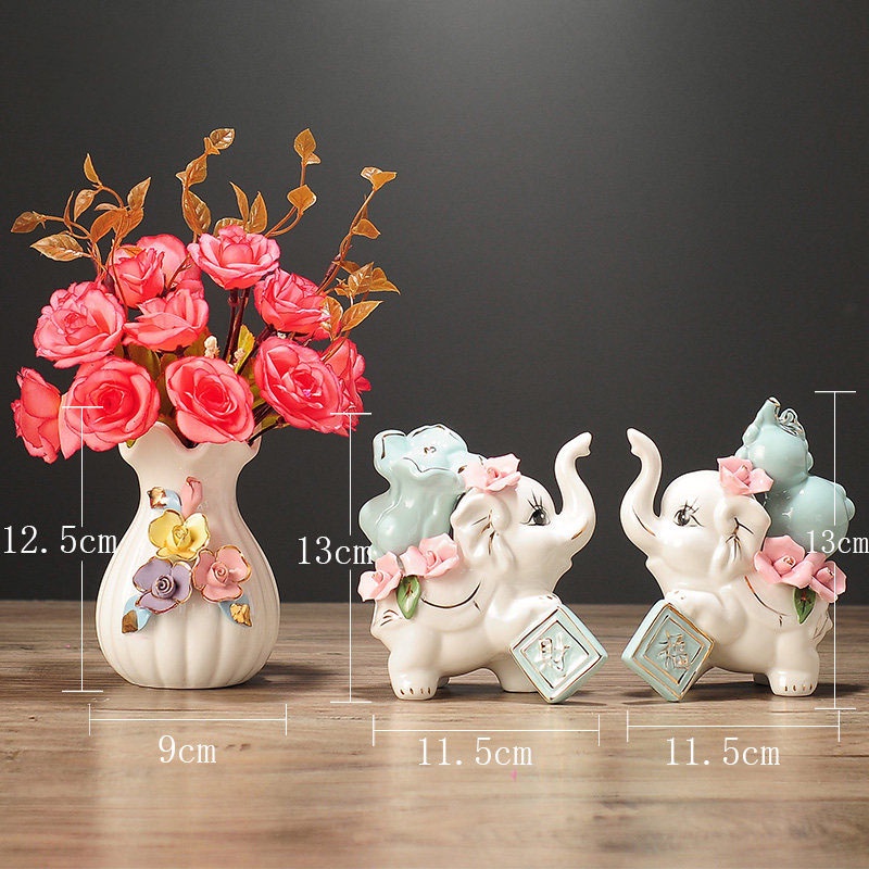 Set tượng đôi voi gốm sứ và bình hoa trang trí phòng sang trọng