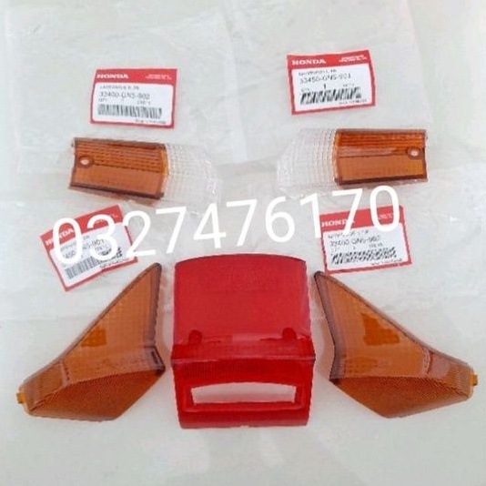Bộ nắp chụp võ đèn hậu ,xi nhan trước sau xe DREAM thái zin