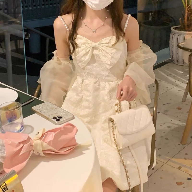 VÁY NƠ NGỰC HAI DÂY NGỌC KÈM TAY PHỒNG