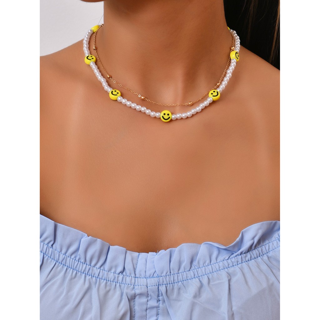 Vòng cổ bohemian chuỗi ngọc trai phổ biến phối mặt cười thời trang dành cho nữ đi tiệc