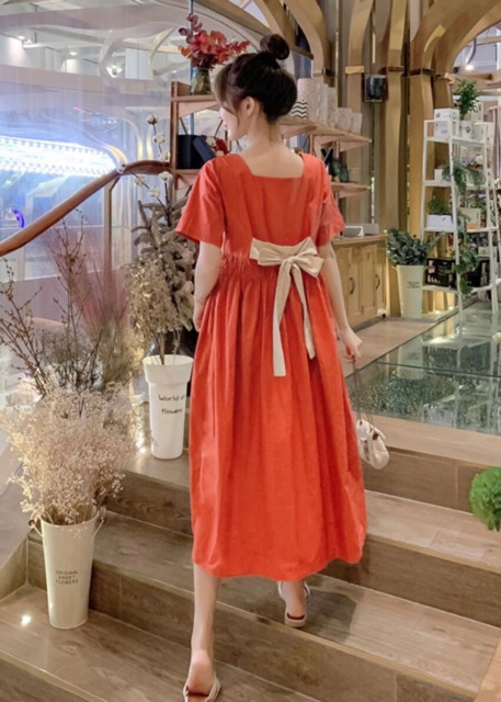Đầm váy babydoll cam nơ sau