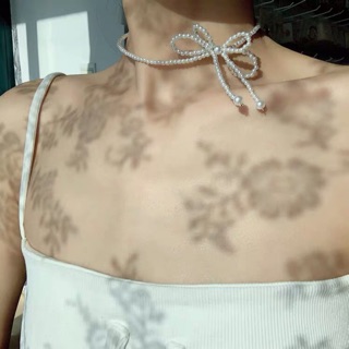Vòng cổ chocker nơ trai xinh