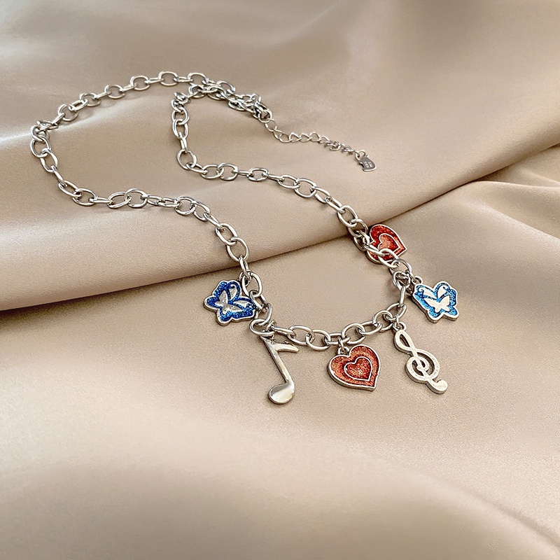 Vòng cổ Thép Titan Mặt Hình Nốt Nhạc Và Bướm Thời Trang Tinh Tế