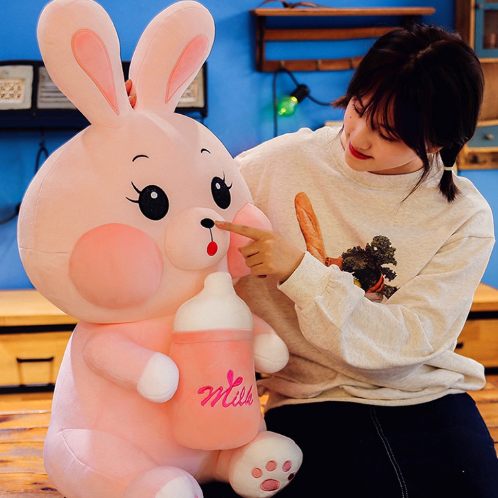 Gấu bông gối ôm thỏ ôm bình sữa thú nhồi bông dễ thương chất liệu mềm mại SHOPBANDON