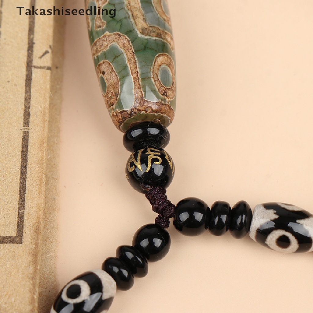 Dzi Mặt Dây Chuyền Hình Đôi Mắt Ma Thuật Takashiseedling