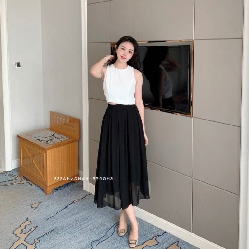 Chân váy TOUSHI đen dáng dài.