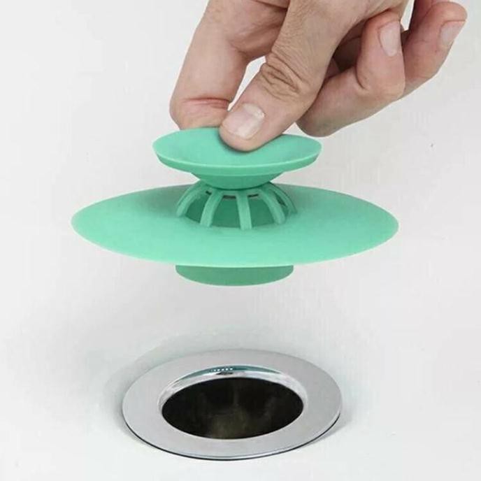 Dụng cụ giữ nước bồn rửa chén có lỗ thoát