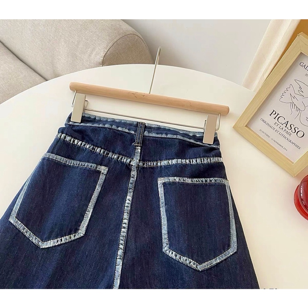 Quần Jeans xanh viền trắng móc cạp Delys