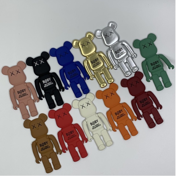 Giá đỡ điện thoại pop kaws bẻ tay trang trí điện thoại
