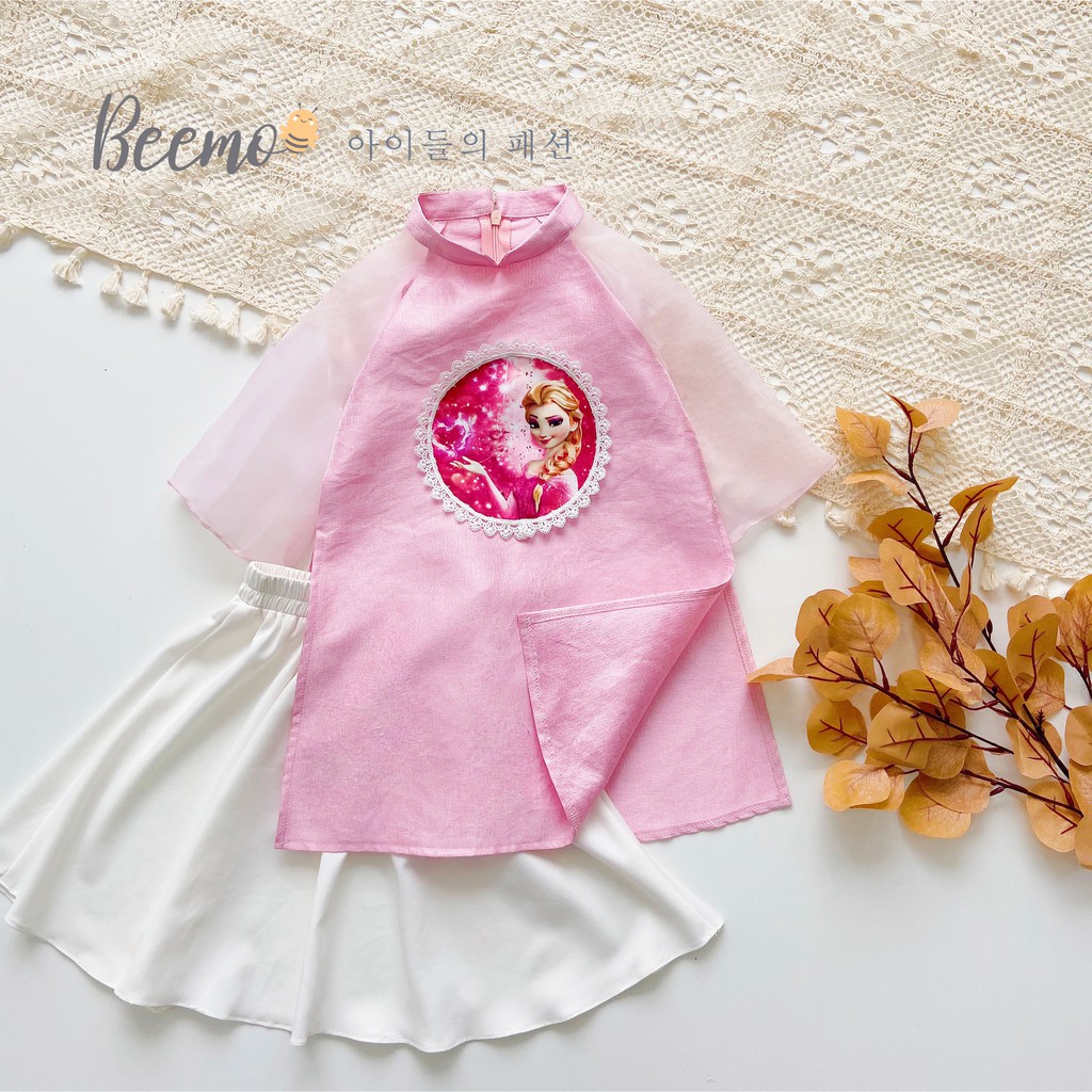 Set áo dài Tết cho bé gái Beemo – Chất liệu gấm tatfa phối tay tơ, họa tiết hình in ELSA và ANNA đáng yêu B085 – Beemo >>> top1shop >>> shopee.vn