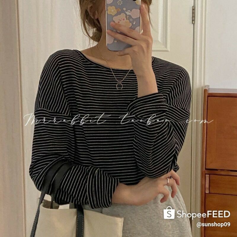 Áo len kẻ gân sóng