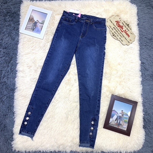 quần jean lệch gấu đính khuy chân | BigBuy360 - bigbuy360.vn