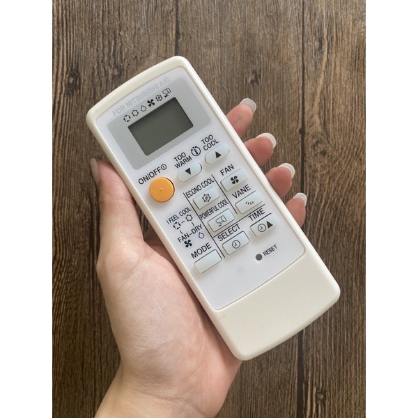 REMOTE MÁY LẠNH MITSUBISHI VIỀN TRẮNG NÚT CAM