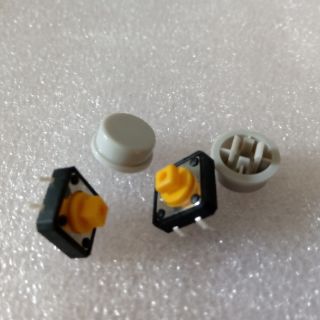 Nút nhấn reset B3F 12x12x7.3 mm màu vàng loại 4 chân cắm.