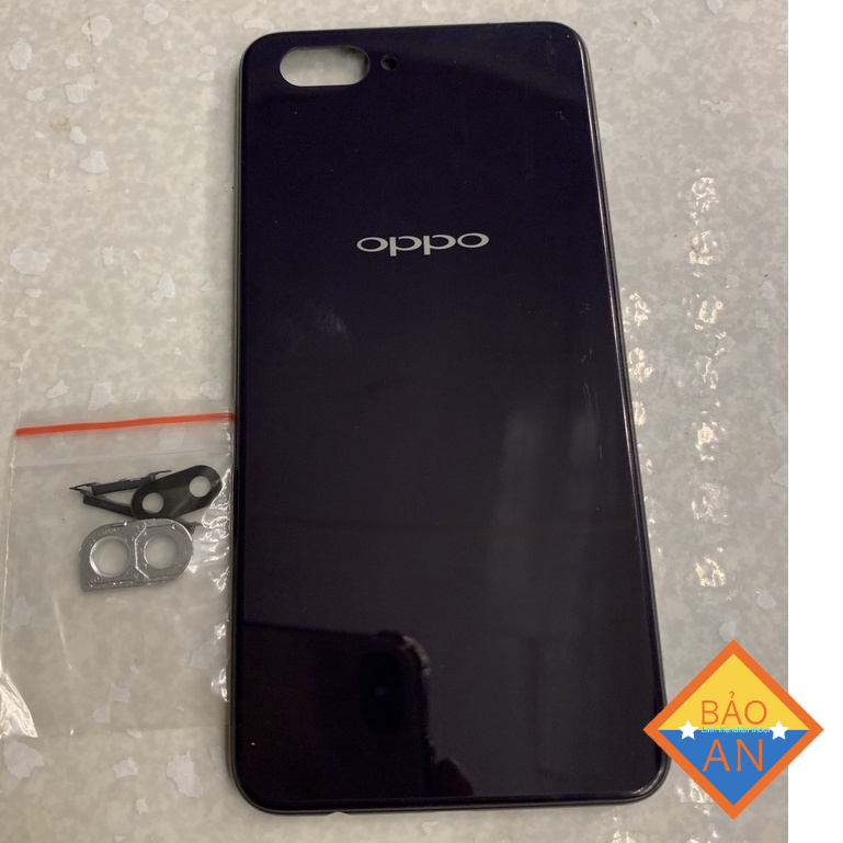 lưng oppo A3S - 32g ( lỗ tróc sim trên ) gồm lưng ,kính cam ,nút bấn