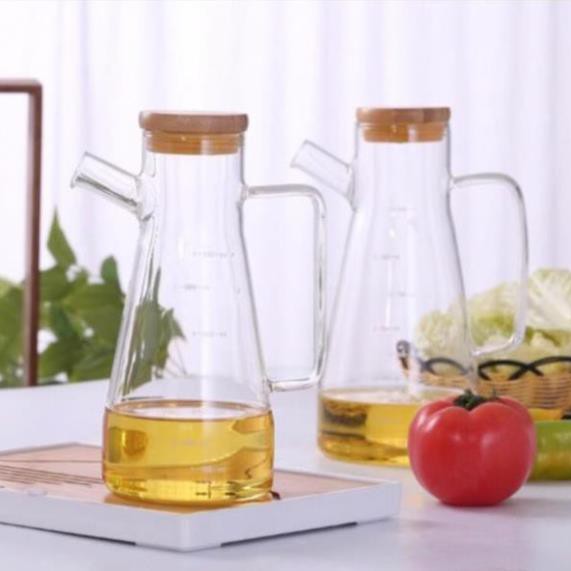 Bình, lọ borosilicate thuỷ tinh có nắp ghỗ , nút silicon đựng dầu ăn , dấm ,nước mắm có chia vạch đong