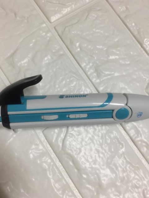 Máy làm tóc 3in1 Shinon là cuốn dập xù,Máy cuốn tóc đã năng.
