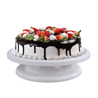 Rotating base holder for cake decoration