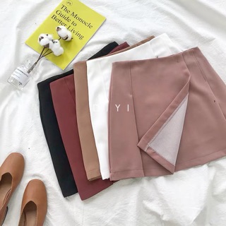 Chân váy xếp ly vạt chéo
