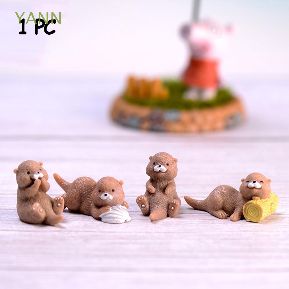 Tượng nhỏ hình rái cá sống động dễ thương dùng trang trí tiểu cảnh