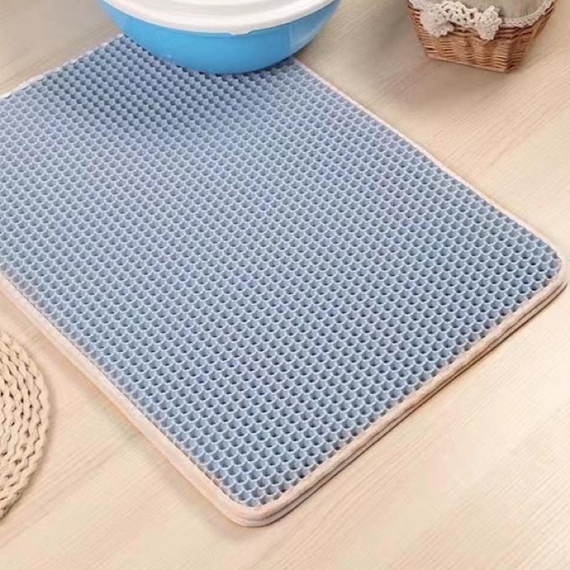 Thảm hứng cát mèo