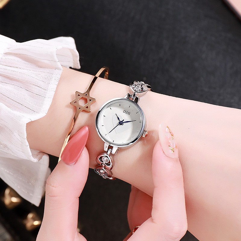 Đồng hồ thời trang nữ lắc Dzg LT07 họa tiết trái tim xinh xắn | BigBuy360 - bigbuy360.vn