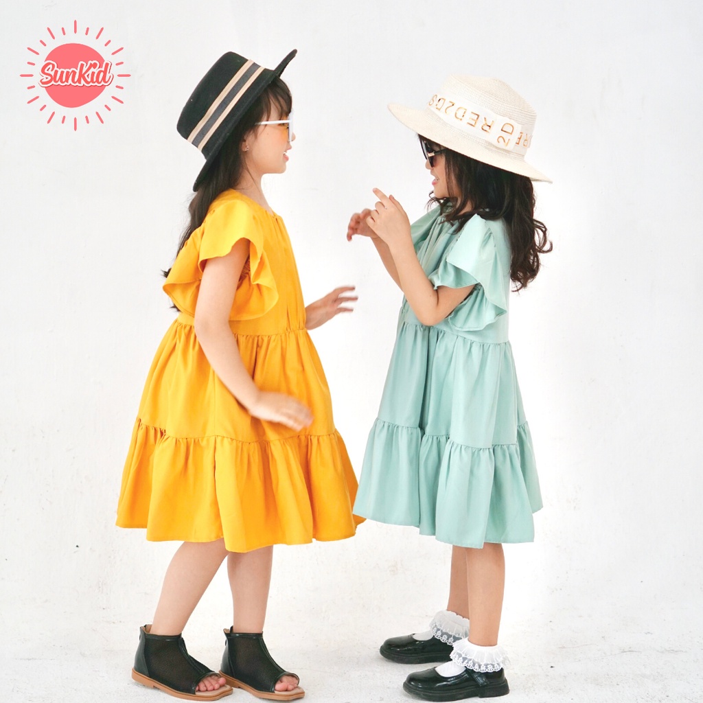 Váy đầm bé gái dáng babydoll trơn vải trượt nhật cao cấp mùa hè Sunkid CT1 màu vàng 4-12 tuổi