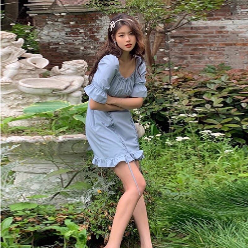 Đầm xanh đan dây Peacebird