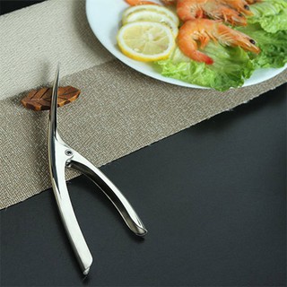 Dụng cụ bóc vỏ tôm