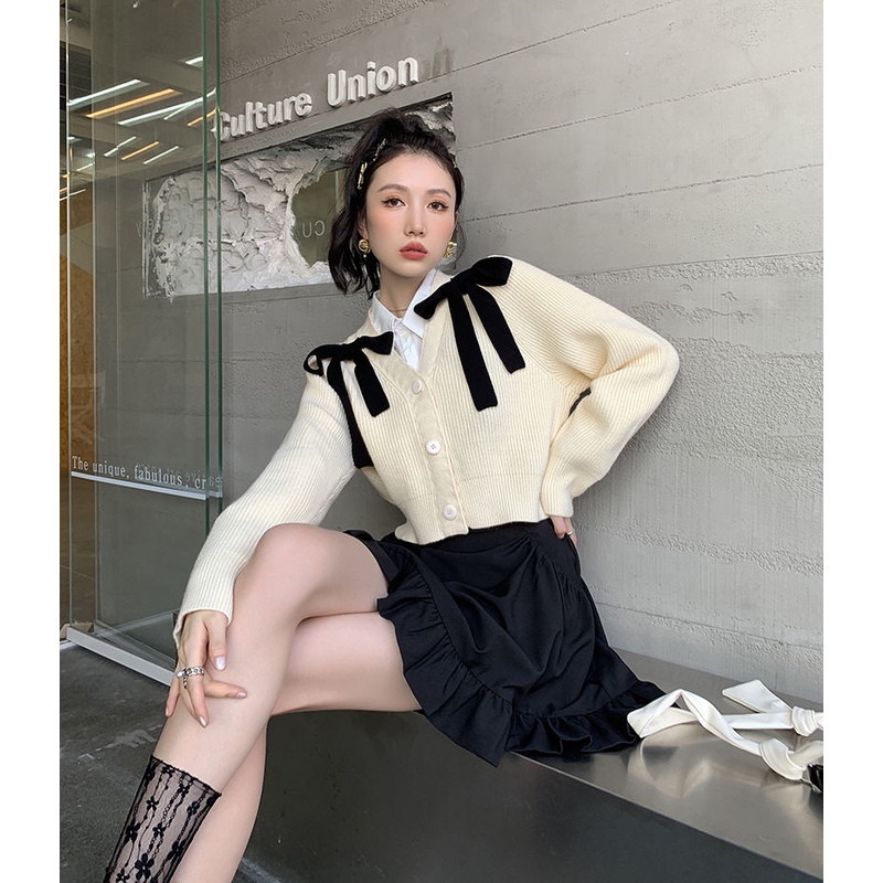 Áo khoác cardigan dệt kim cổ chữ V đính nơ phong cách mùa thu mới cho nữ