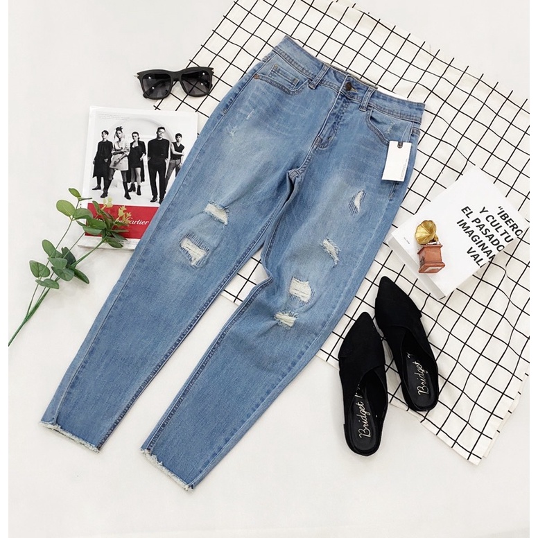 Quần jeans thiêu rách
