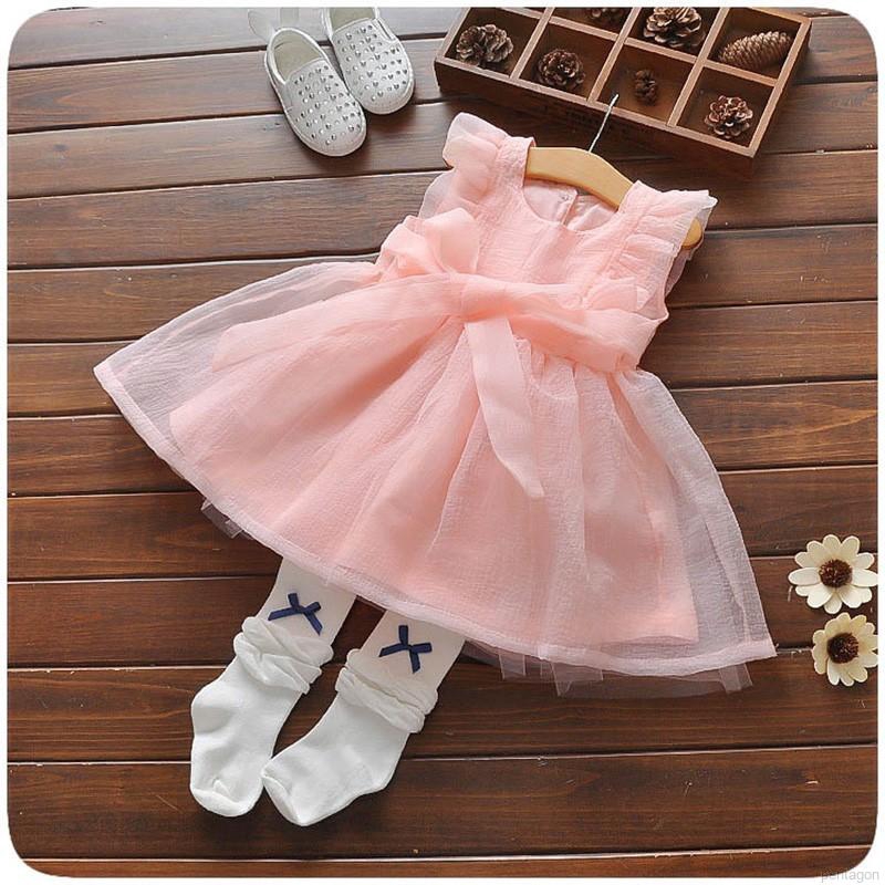 Đầm bé gái thắt nơ eo