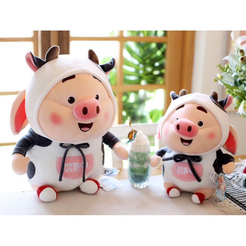 Thú bông heo tik tok mang áo bò sữa