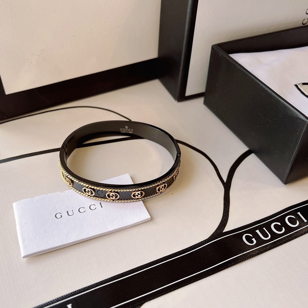 Vòng Tay Gucci Bằng Thép Titan Họa Tiết Hai Chữ GG