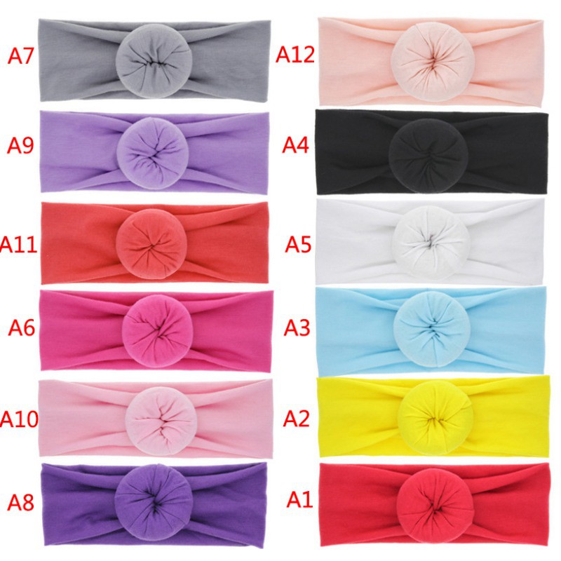 Băng đô phối nút buộc tròn xinh xắn cho bé