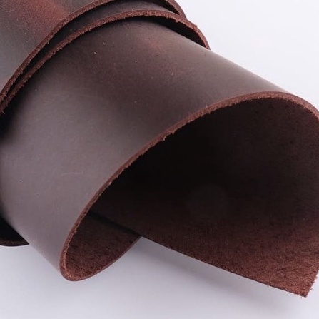 Da bò thuộc miếng làm bằng da bò thật kích thước 190 X 280 MM dùng làm lót chuột hoặc nguyên liệu làm ví da bao da