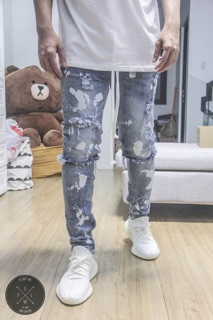 Bleached waxed zipper jeans