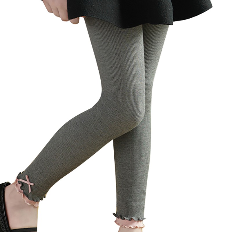Quần legging co giãn màu trơn đính nơ xinh xắn thời trang cho bé gái