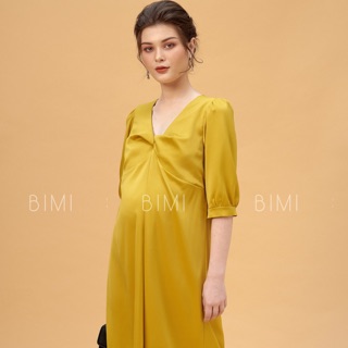 Đầm vàng xoắn ngực - bimi