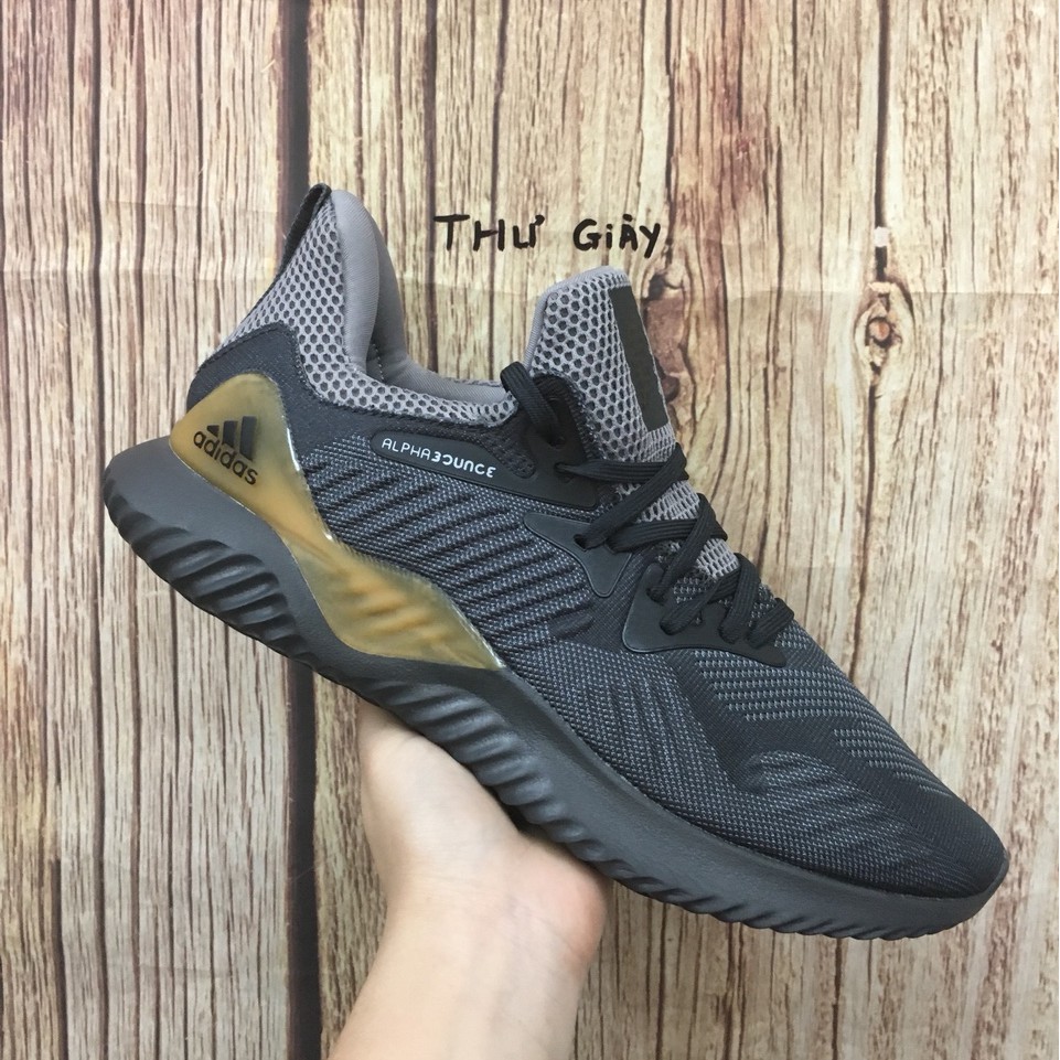 Giày thể thao sneaker Alphabounce xám gót vàng bản trung Hot trend