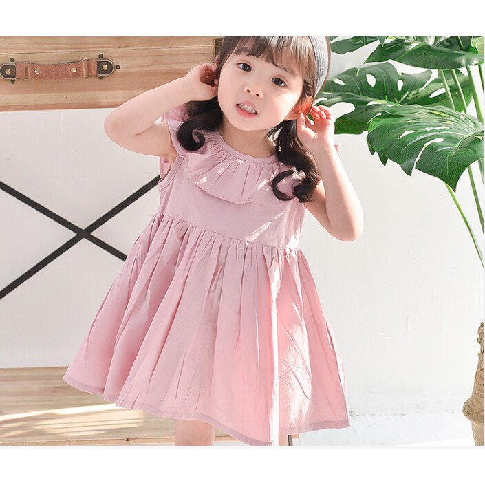 Váy đính nơ cổ bèo cho bé gái