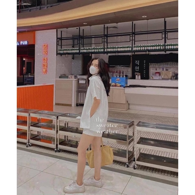 Áo sơ mi cúc xẻ tà