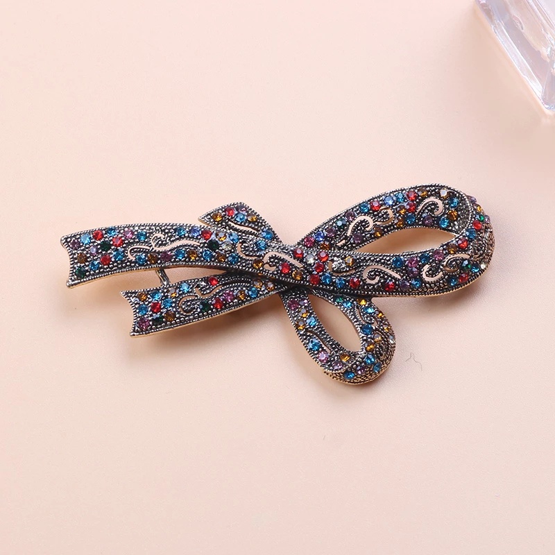 Ghim Cài Áo Hình Nơ Đính Đá Và Ngọc Trai Thiết Kế Sang Trọng