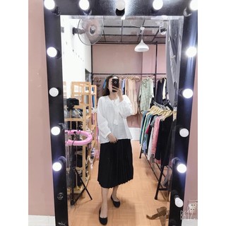 Chân váy xếp li bầu.