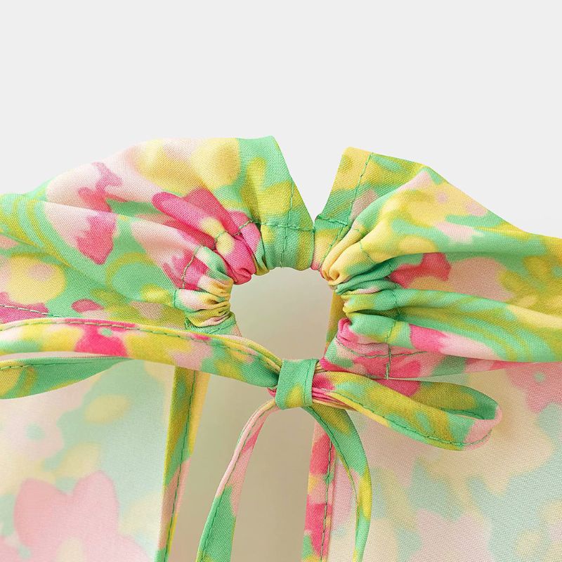 Áo Croptop Sát Nách Cổ Chữ V Thắt Nơ Hở Lưng Họa Tiết Hoa Phong Cách Quyến Rũ