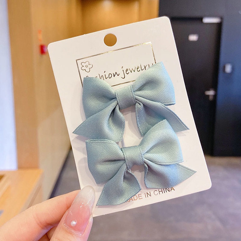 Set 2 kẹp tóc trang trí nơ đáng yêu dành cho bé gái